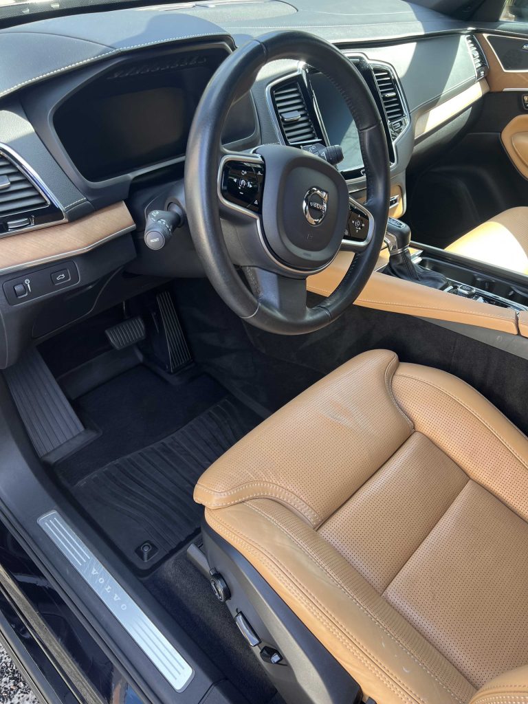 Detailed Volvo leather seats and steering wheel area after interior detailing in Halifax, Nova Scotia.| Halifax Waterfront | leather seat cleaning | deep vacuum | interior wipe down